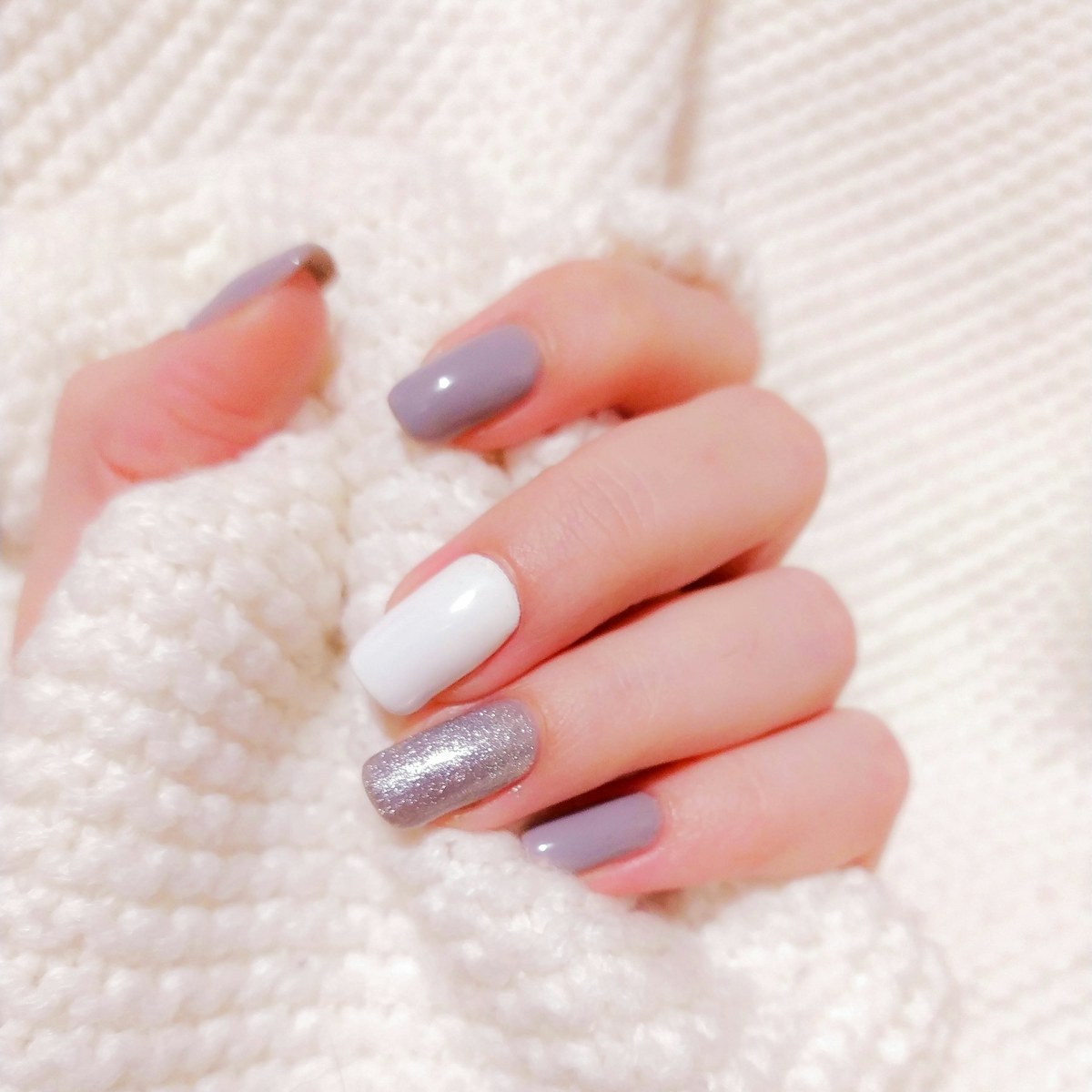 Press-on nails rendered on a hand at studio quality
